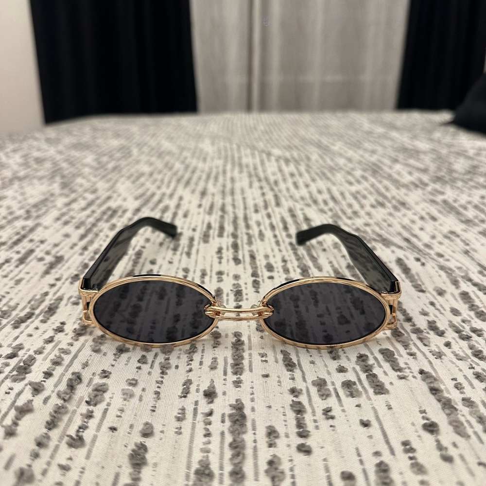 Elegant Gold and Black Sunglasses